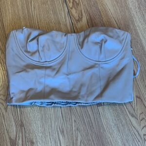 Tan crop
